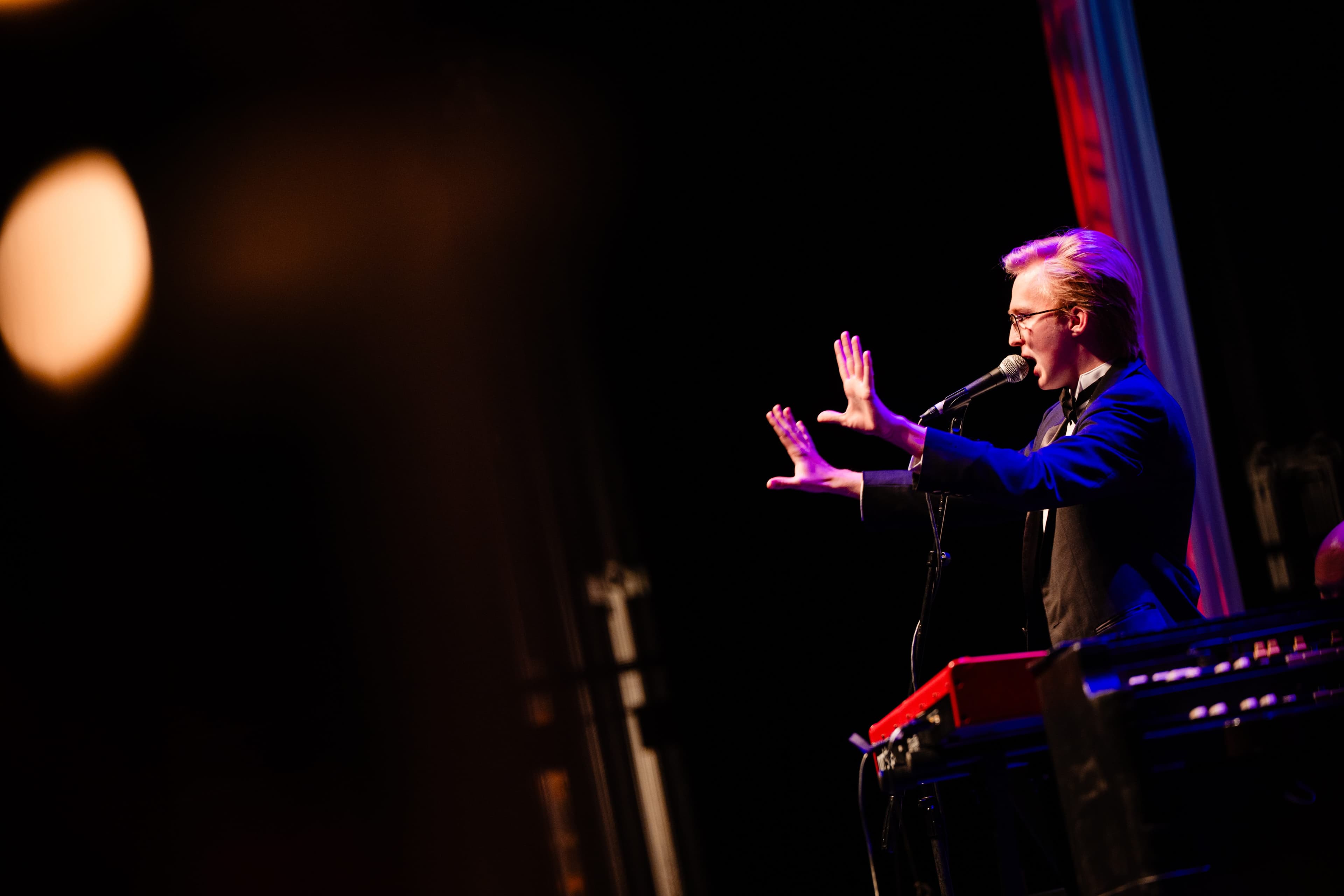 High School Student JT Loveless performing at Masquerade Ball